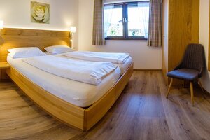 Schlafzimmer der Ferienwohnung Nr. 1- Jennerblick - im Gästehaus Frauendorf 